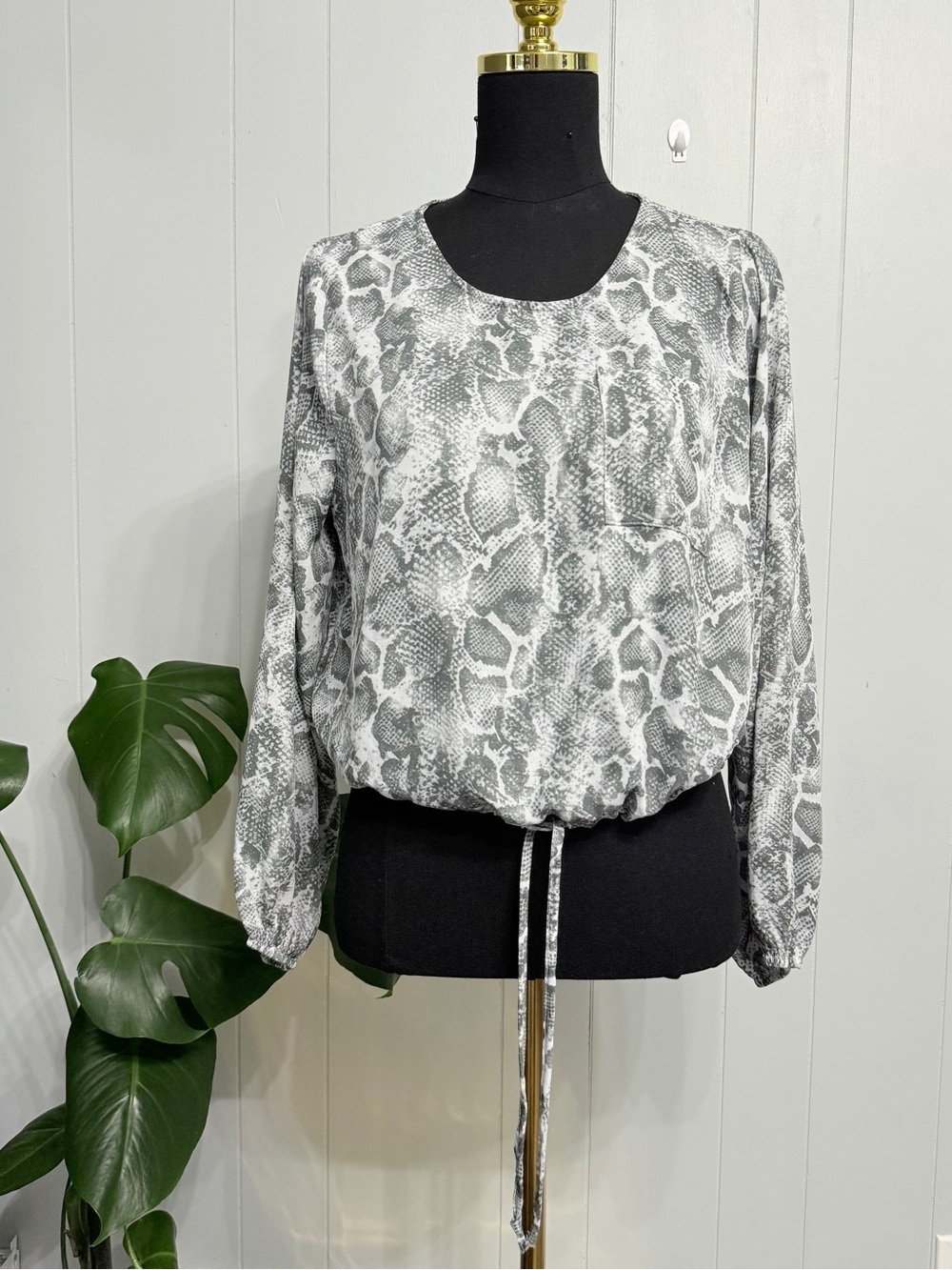 #9) Belle Du Jour Grey Snake-Print Drawstring Hem Blouse